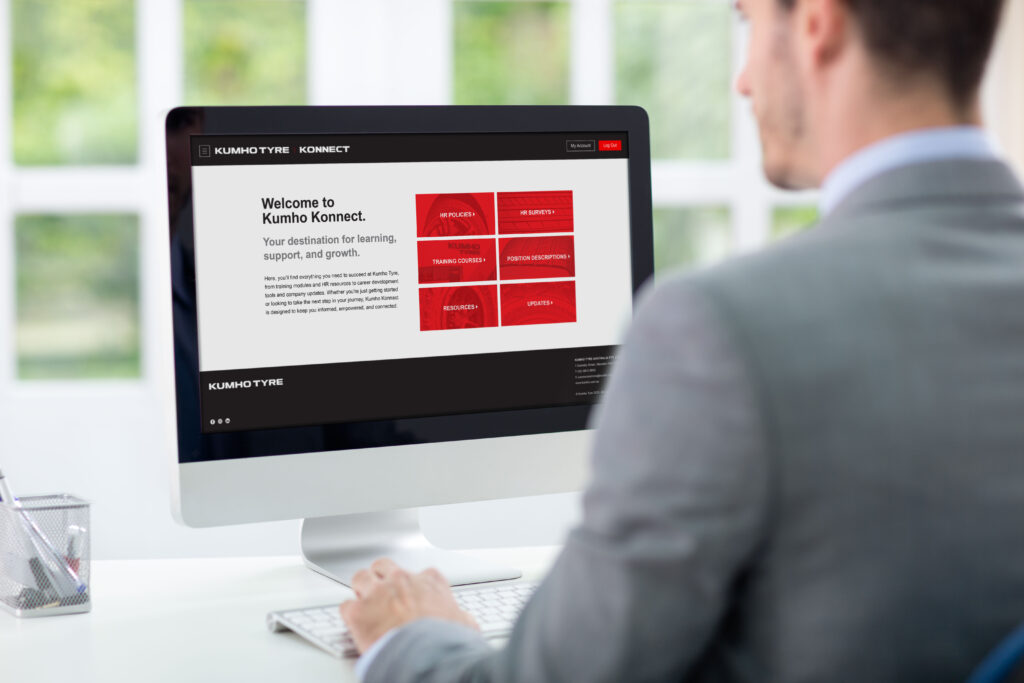 Businessman viewing a custom eLearning platform on a computer screen
